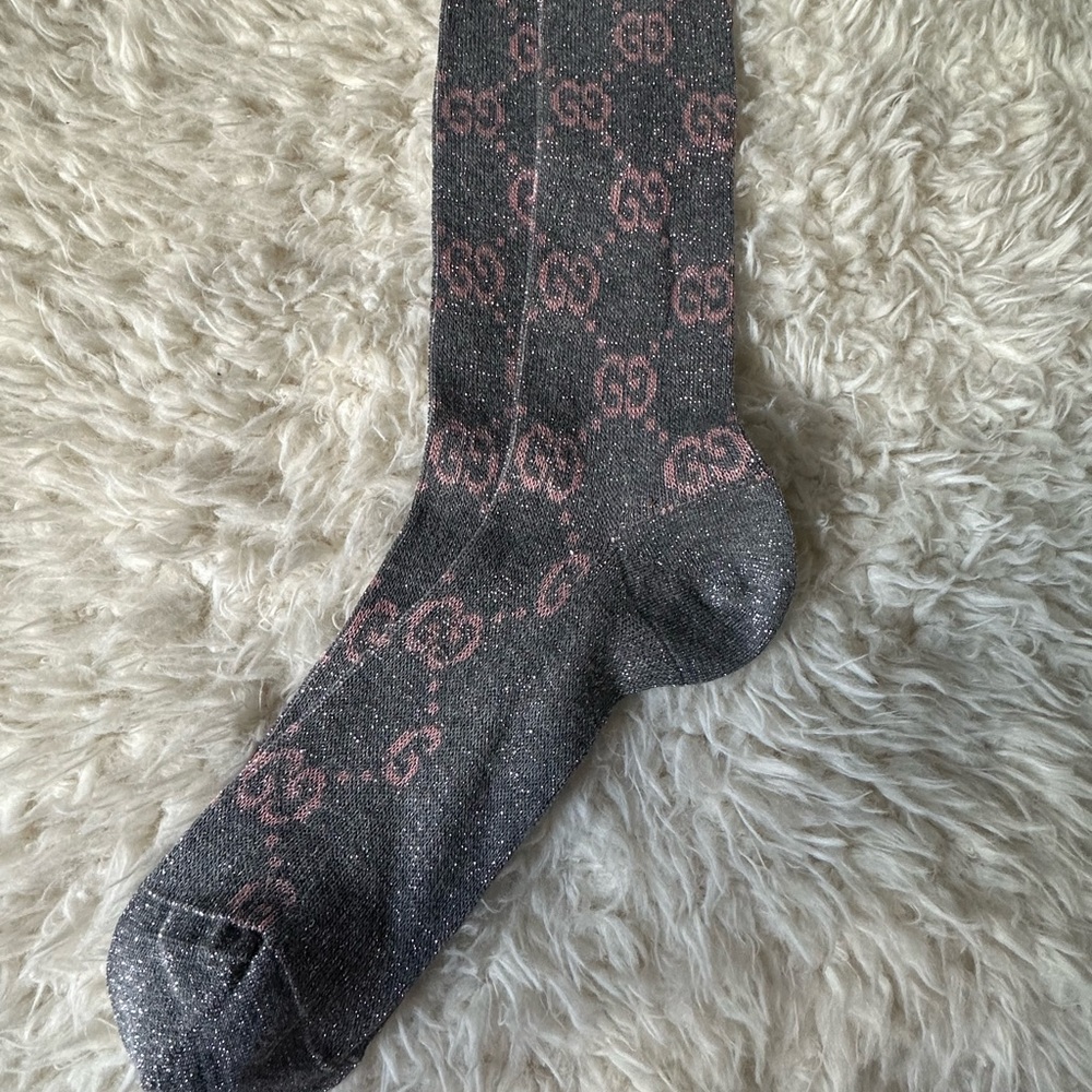 Silver and pink Gucci socks.